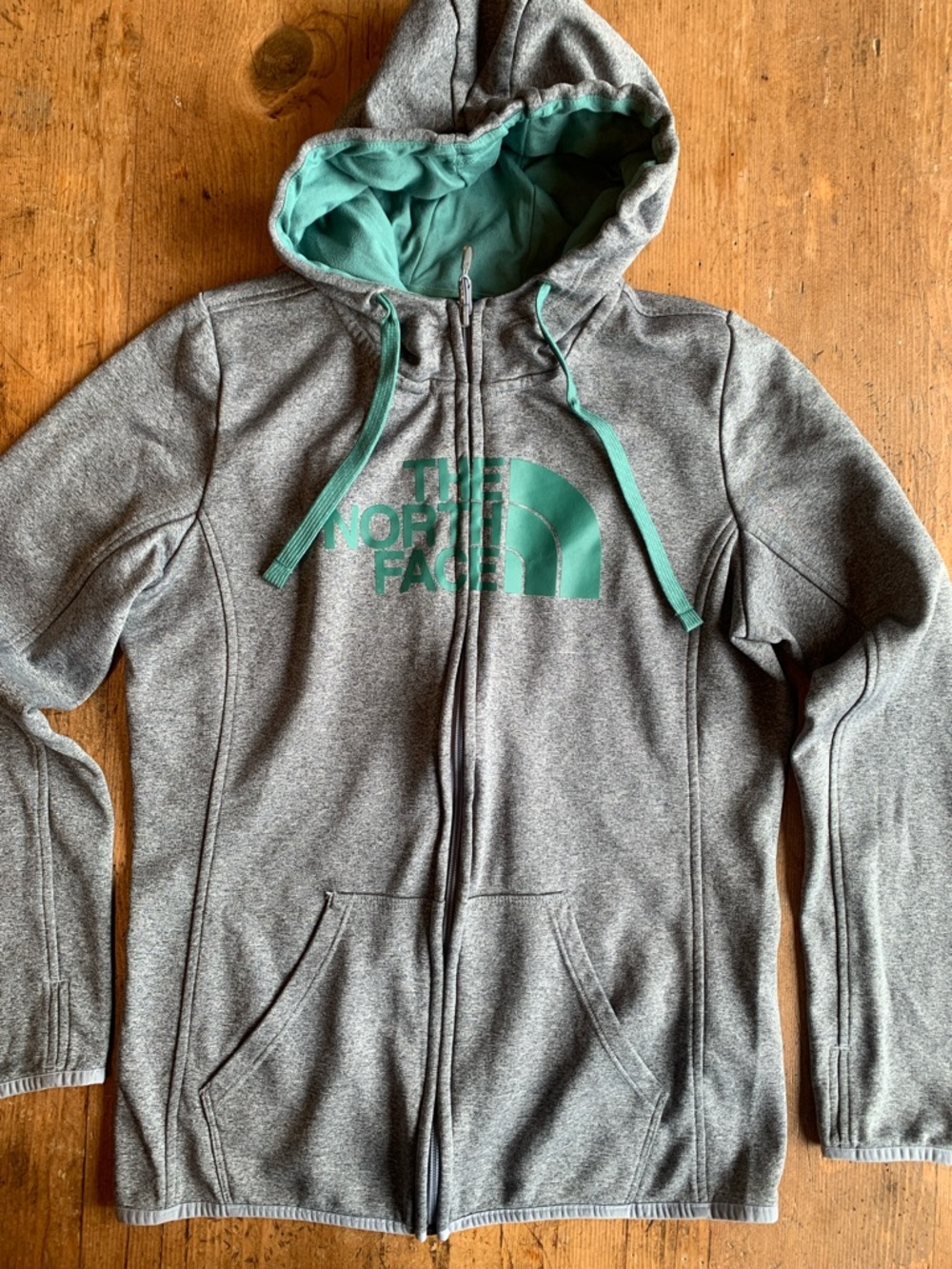 The North Face Gray Hoodie with Teal Logo and Lining